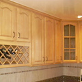 natural_maple_cathedral_kitchen_cabinets.JPG