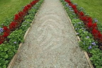 gravel-path-surrounded-by-flowers