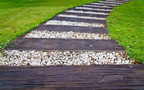 16353195-walkway-made-a-a-of-wood-and-stone-on-the-grass